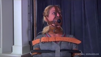 Blond milf cherie deville tied gagged in a straitjacket and motorized wheel chair smoke a cigarette